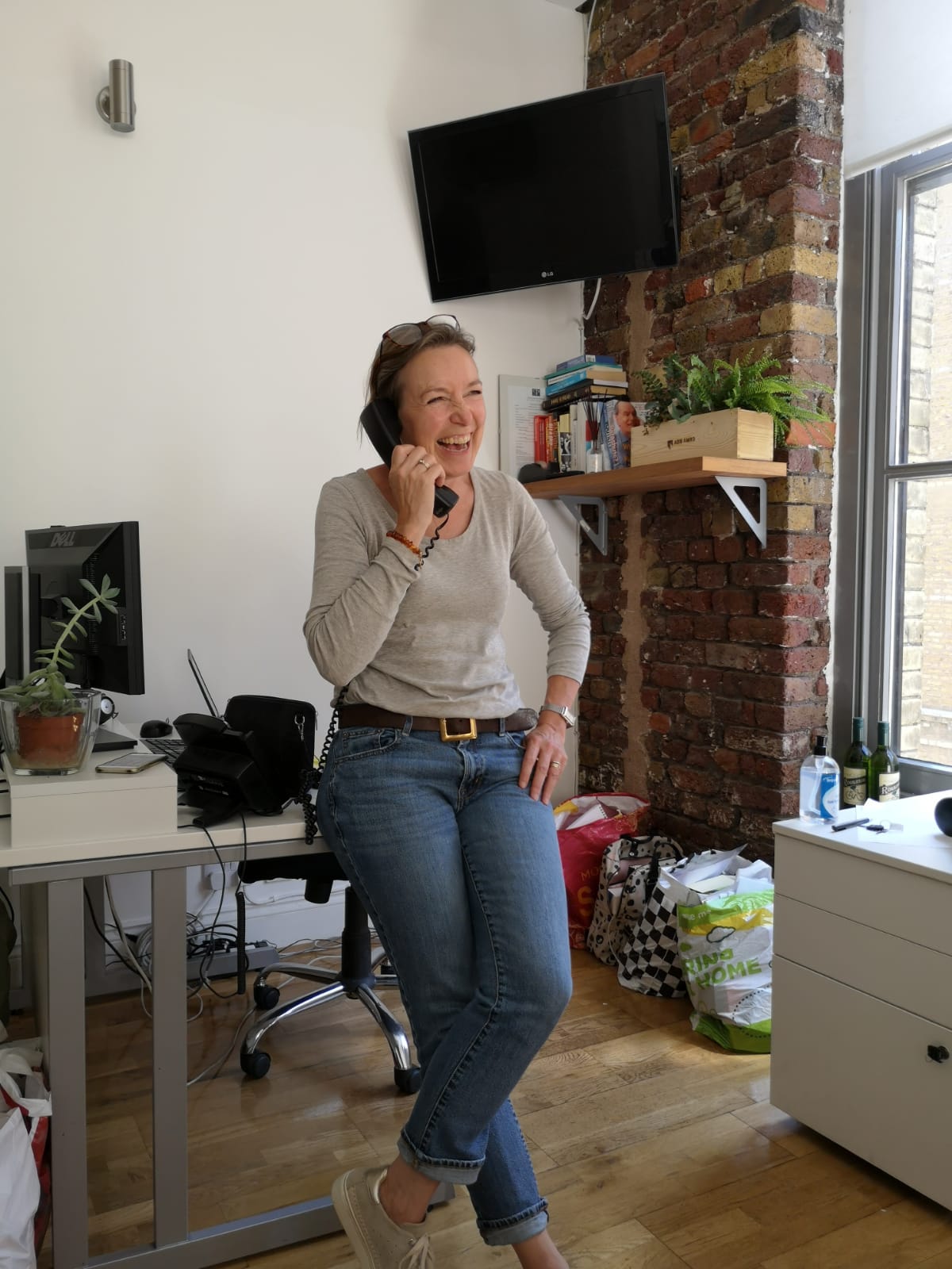Jane laughing on the phone