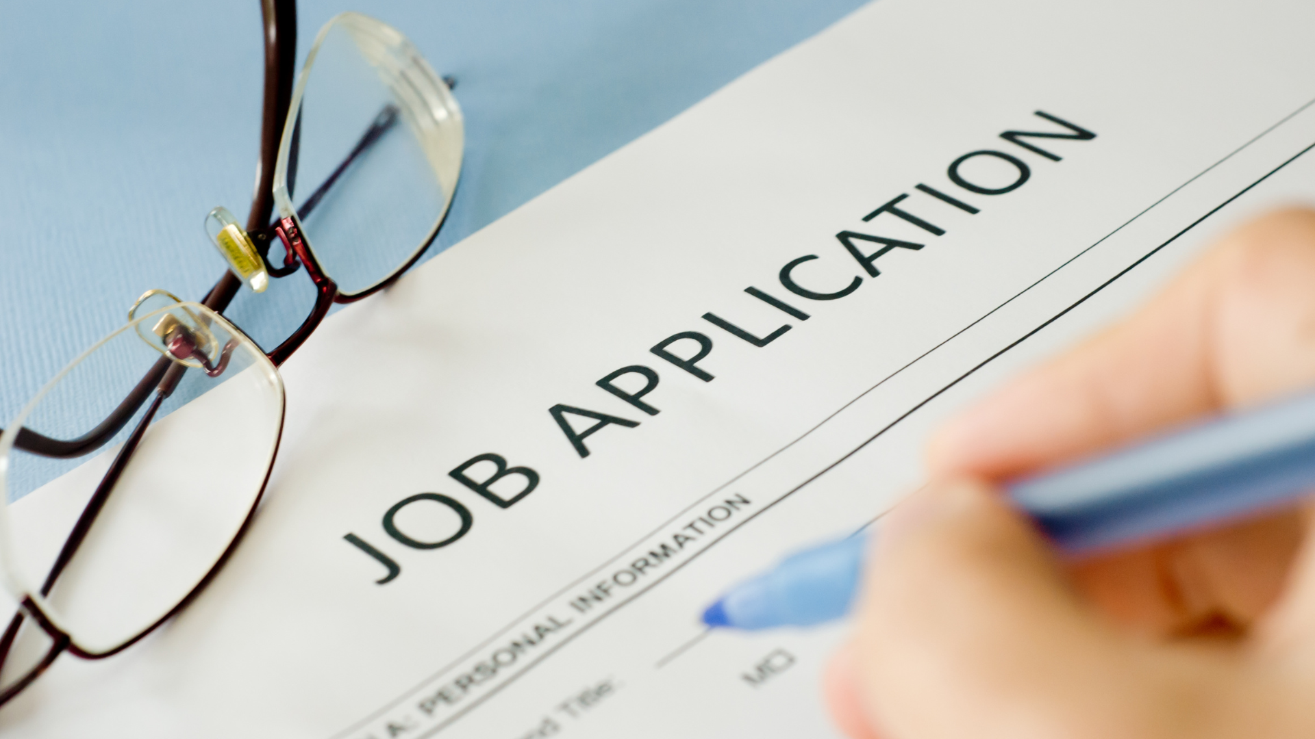 Job application form being filled in - media jobs london