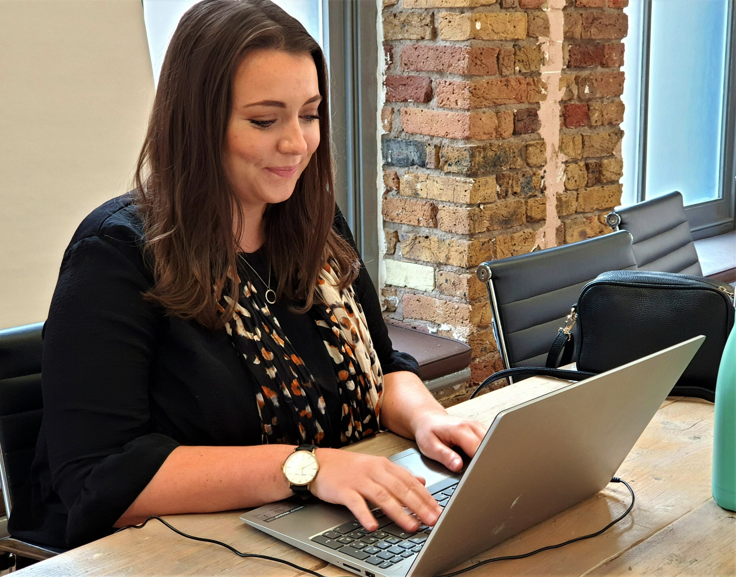 Laurie working at her computer